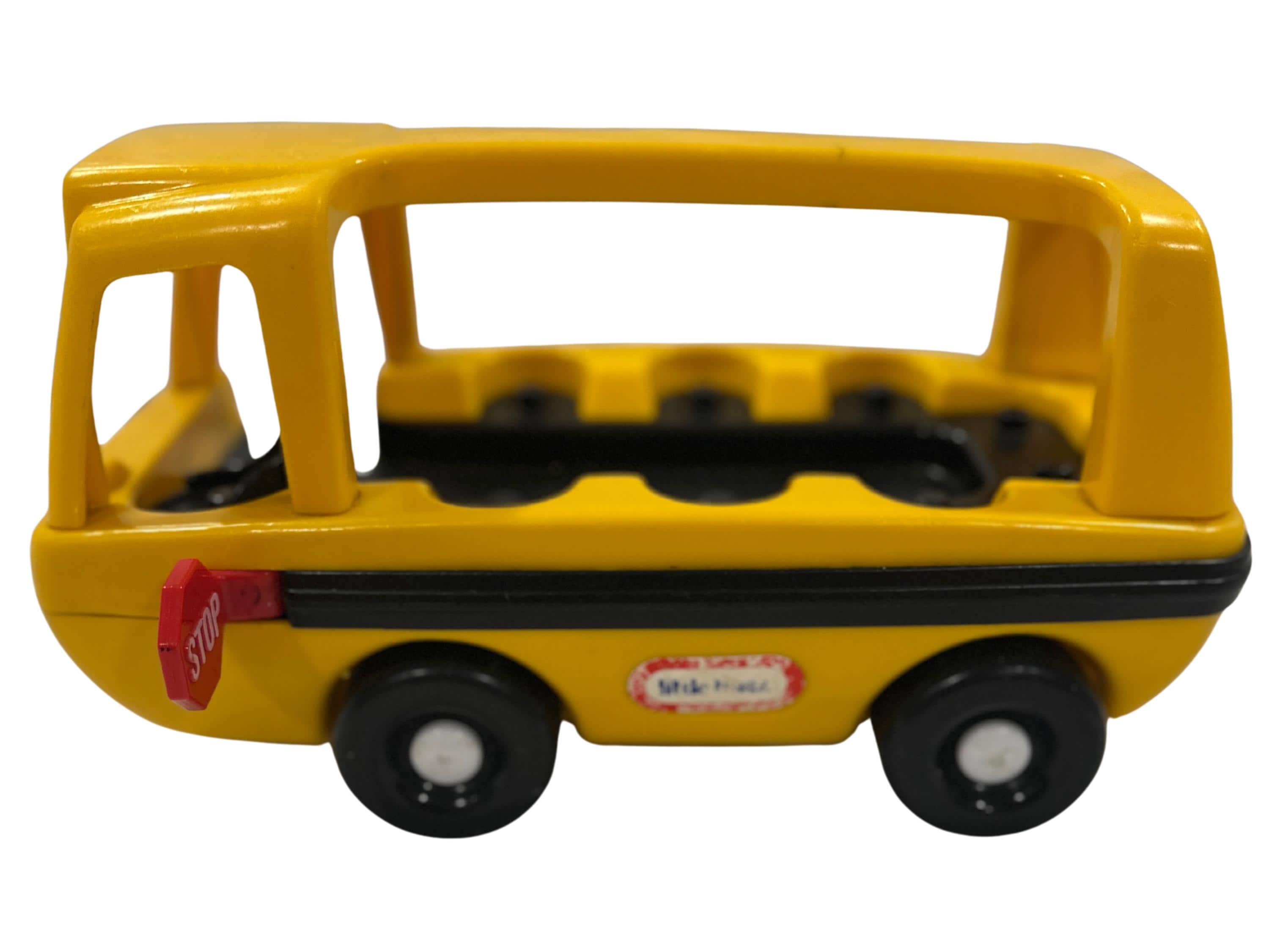 Vintage little tikes school bus: 1980s yellow plastic toy